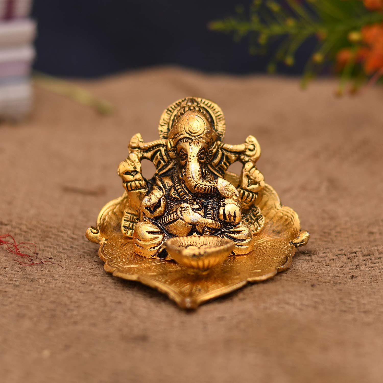 Ganesh Idol On Leaf,Lord Ganesha With Diya,Metal Home Decorative Puja Gift-Dfbs195