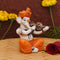 Showpiece of musician Lord Ganesha playing violin Statue