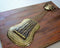 Metal Guitar On MDF Panel Mounted Wall Hanging Showpiece