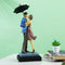 Couple Under Umbrella Resin Showpiece CPLMAS117