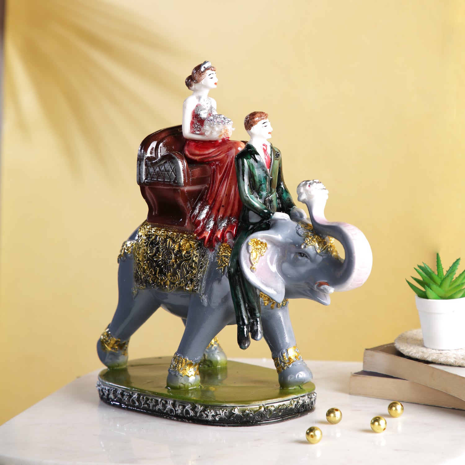 Resin Couple Sitting On Elephant Decorative Showpiece Cplmas110