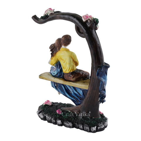 Resin Love Couple Sitting on Tree Statue